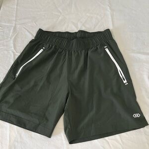 Men’s green Legend athletic shorts. Size medium 6.5 inch inseam.